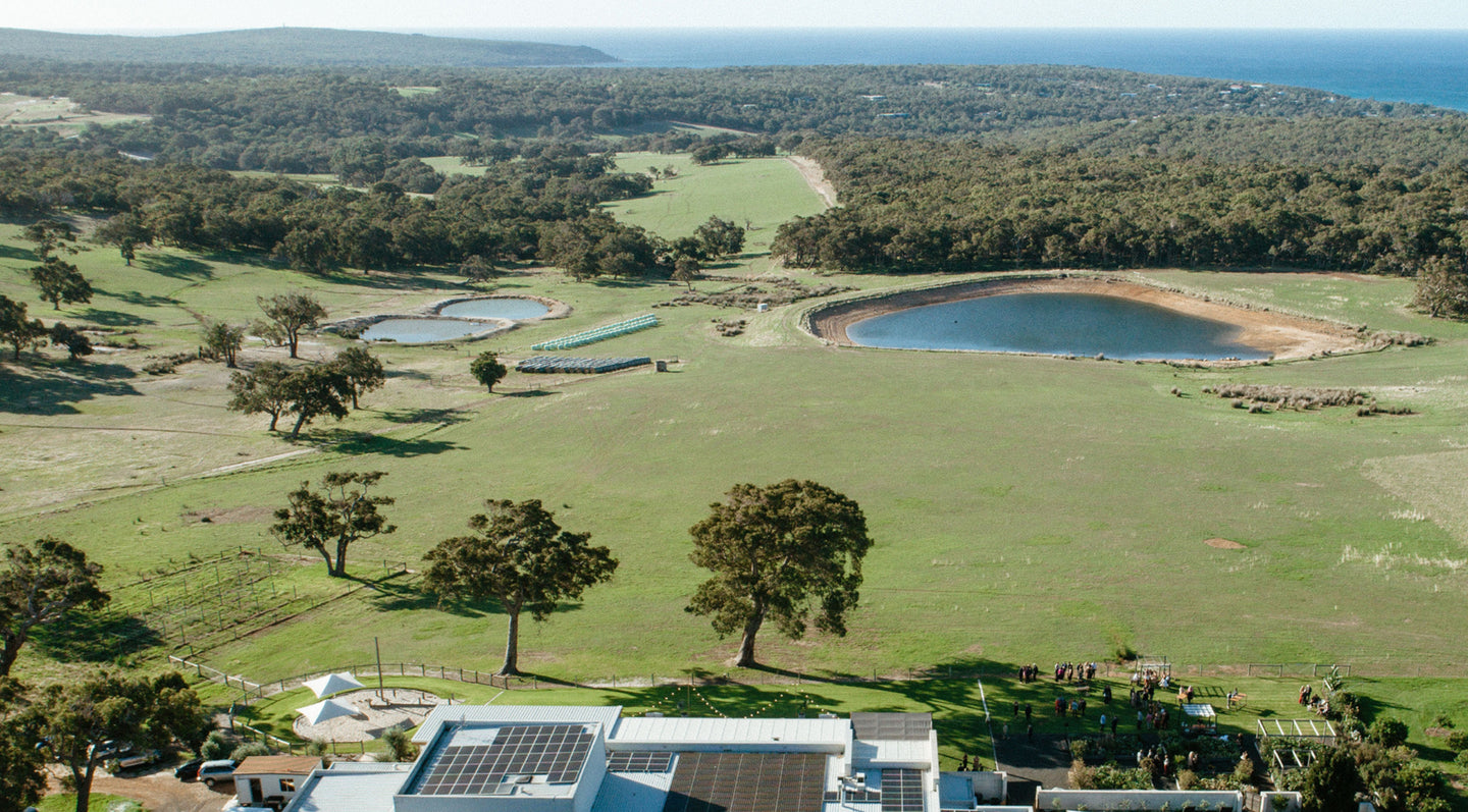 Arial view of the Eagle Bay Brewing Co brewery, farm and ocean.