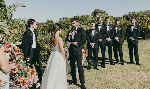 A couple getting married at Eagle Bay Brewing Co's Margaret River region wedding venue in a grassy setting
